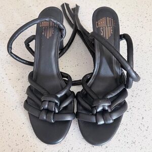 Charlotte Stone Heeled Sandals featuring a knotted strap design and ankle ties.